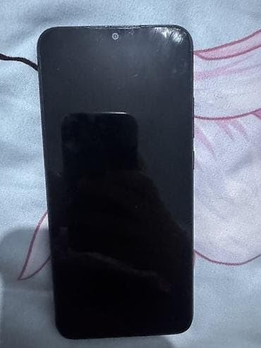 Смартфон Redmi 10A в черном цвете с операционной системой Android — 2