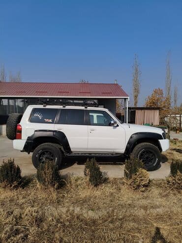 капот нексия 1: Nissan Patrol: 2004 г., 4.8 л, Автомат, Газ, Внедорожник — 1