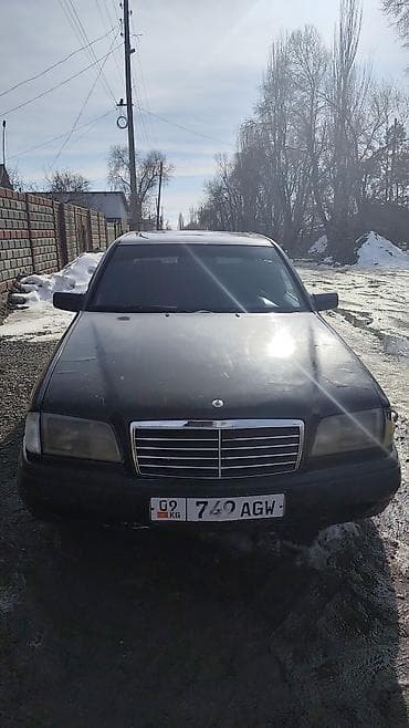 honda stream крыло: Седан темно‑серого цвета с тонированными стеклами. Кузов 4‑дверный — 3