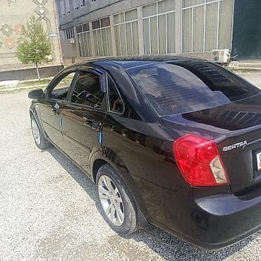 спарк капот: Daewoo Gentra: 2013 г., 1.5 л, Механика, Газ, Седан — 4