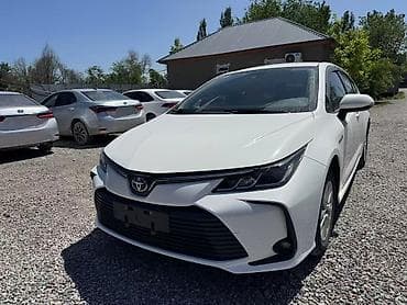 селика: Toyota Corolla: 2021 г., Гибрид, Седан — 2