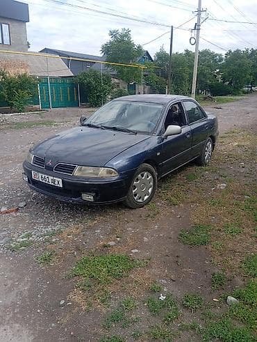 sorento 2019: Mitsubishi Carisma: 2002 г., Седан — 1