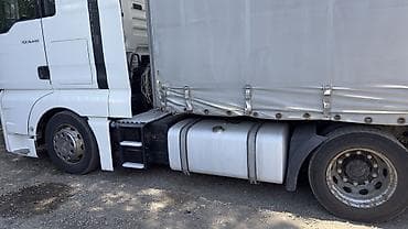 полный комплектация: Тягач, MAN, 2015 г., Тентованный — 2
