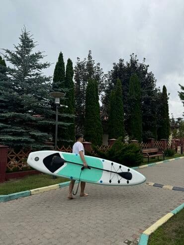 кара суу базары аренда: Сапборд с веслом, выполненный в белом, мятном и черном цветах. Доска — 1