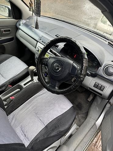 дом передвижной: Mazda Demio: 2003 г., 1.3 л, Автомат, Бензин, Хэтчбэк — 2