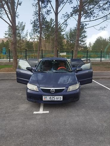 Mazda Familia: 2003 г., 1.3 л, Механика, Бензин, Универсал