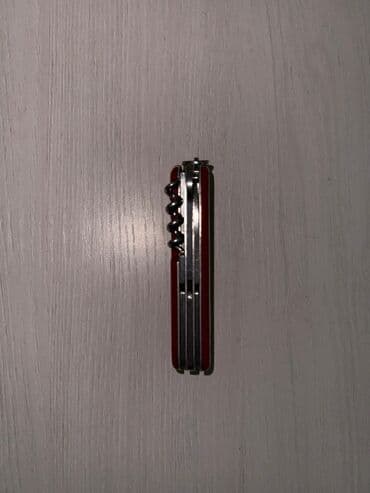 Музыкальные инструменты: Мультитулы и швейцарские ножи (набор) 1) Красный швейцарский нож — 8