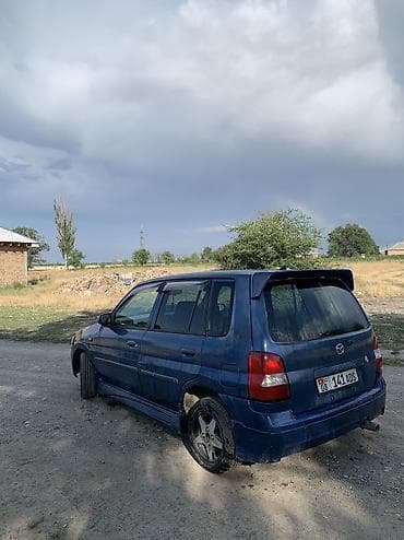 Унаа: Mazda Demio: 2002 г., 1.3 л, Кол менен иштөөчү, Бензин, Хетчбек — 2