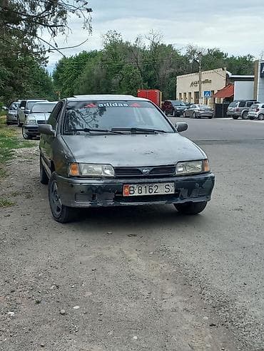 bcd com: Nissan Primera: 1991 г., 1.6 л, Механика, Бензин, Седан — 1
