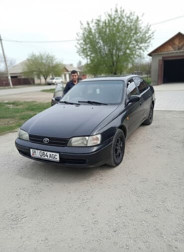 тайота ландкрузер 80: Toyota Carina: 1995 г., 2 л — 1