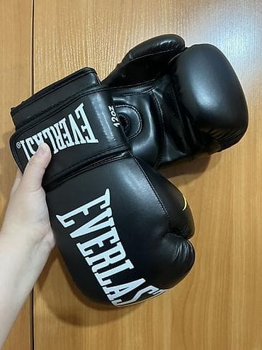 Перчатки: Боксерские перчатки Everlast, черные - Размер/вес: 12 oz (маркировка — 1