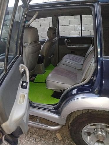 forester 2003: Ssangyong Musso: 1994 г., Механика, Внедорожник — 1