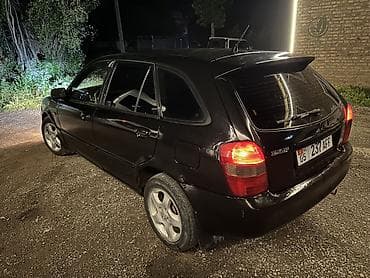 салон жасайбыз: Mazda 323: 2001 г., 1.6 л, Кол менен иштөөчү, Хетчбек — 7