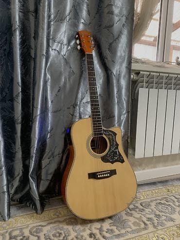 Гитары: Электроакустическая гитара формата дредноут с вырезом. Характеристики — 7