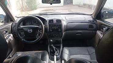 jetta volkswagen: Mazda 323: 2002 г., 1.6 л, Механика, Бензин, Хэтчбэк — 7