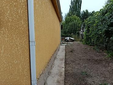купить квартиру в рассрочку от застройщика: Дом с участком и навесом для авто - Одноэтажный дом с жёлтым фасадом — 2