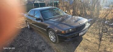 обмен авто с доплатой: BMW 7 series: 1995 г., 4 л, Механика, Бензиновая, Седан — 10