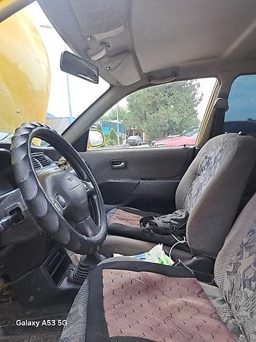 авто компании: Daihatsu Sirion: 1998 г., 1 л, Механика, Бензин, Хэтчбэк — 8