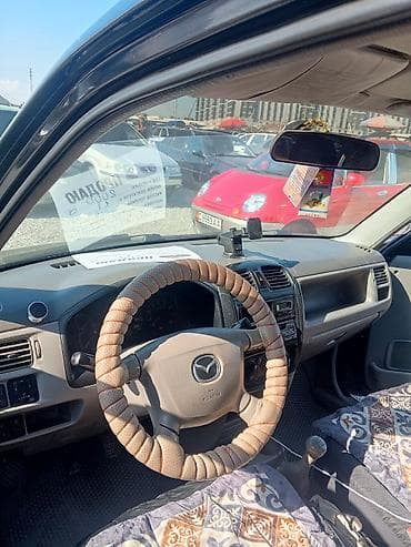 Транспорт: Mazda Demio: 2000 г., Механика, Хэтчбэк — 4
