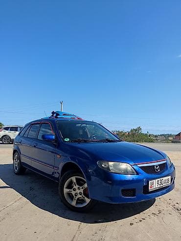 Mazda Familia: 2002 г., 1.6 л, Механика, Бензин, Универсал