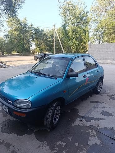 smart car: Mazda 121: 1991 г., 1.3 л, Механика, Бензин, Седан — 2