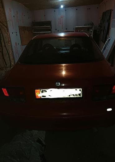 Транспорт: Mazda 626: 1994 г., 2 л, Механика, Бензин, Седан — 3