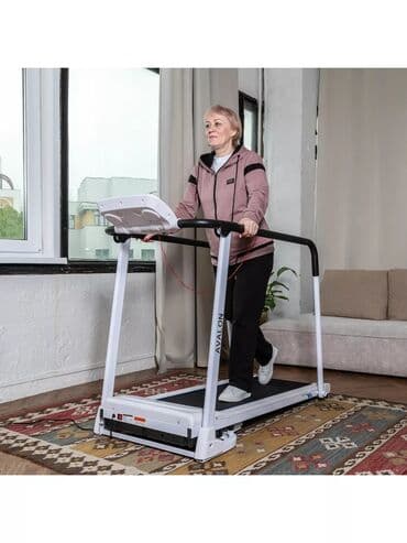 тренажер беговая дорожка для дома цена: Беговая дорожка белого цвета с чёрными акцентами и поручнями — 1