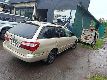 Транспорт: Mazda Capella: 2002 г., 1.8 л, Механика, Бензин, Универсал — 7
