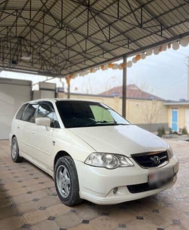 купить шипованную резину: Honda Odyssey: 2003 г., 2.3 л, Типтроник, Бензиновая, Минивэн — 2