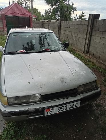 Mazda 626: 1999 г., Седан — 1