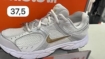 крассовки найк: Кроссовки Nike (модель в беговом стиле) — белые с золотым Swoosh. - — 1