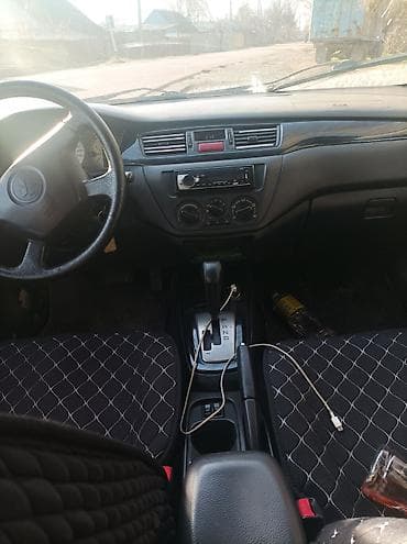 митсубиси паджеро ио: Mitsubishi Lancer: 2004 г., 1.6 л, Автомат, Бензин, Седан — 6
