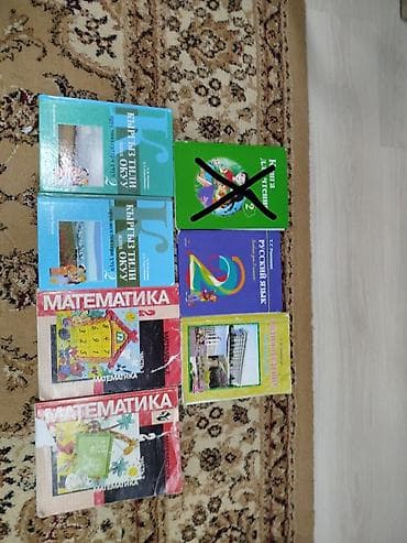 Комплект школьных учебников для 2 класса. В составе: - Кыргыз тили