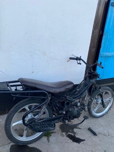 мото мапет: Мопед с черной рамой и синим обвесом. Модель куп 125 не надо оснащена — 2