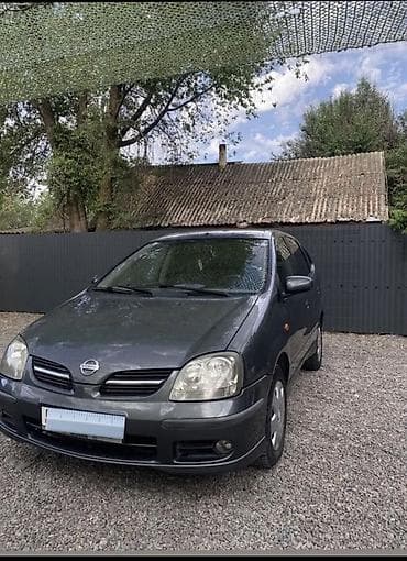стояла: Nissan Almera Tino: 2004 г., Механика, Хэтчбэк — 1