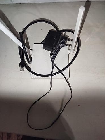 Модемы и сетевое оборудование: Wi‑Fi роутер с двумя внешними антеннами Описание: - Беспроводной — 2