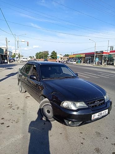 Daewoo Nexia: 2010 г., 1.5 л, Кол менен иштөөчү, Бензин, Седан — 3