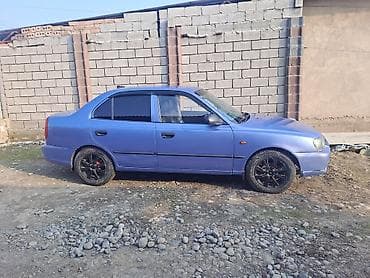 Другие аксессуары: Седан синего цвета с тюнинг‑элементами и практичным салоном — 7