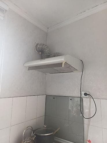 Кухонная вытяжка купольного типа с отводом в вентиляцию