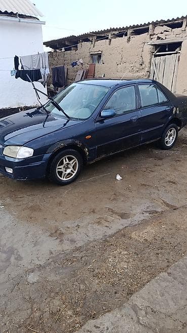 Mazda Familia: 2000 г., 1.5 л, Механика, Бензин, Седан — 1
