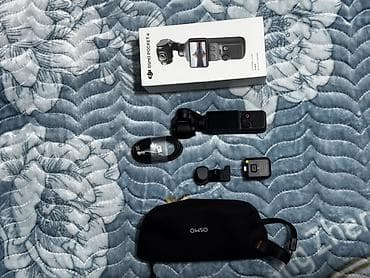 Фото и видеокамеры: DJI Osmo Pocket 4 — карманная камера со встроенным 3‑осевым — 1