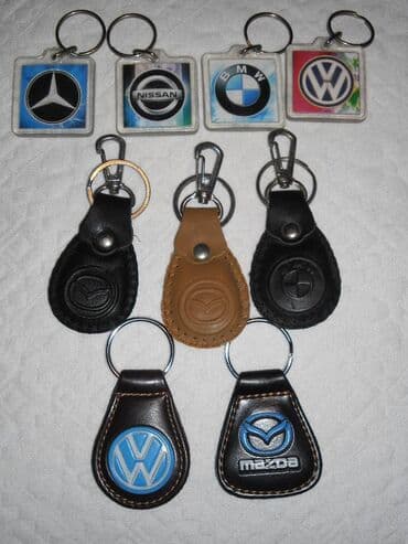 автомобильные аксессуары: 1. Верхний ряд мигающие AUDI=20 сом. Второй ряд NISSAN=50 сом — 7