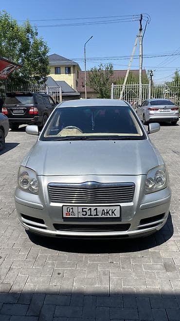 Седан серебристого цвета с киргизскими номерами “01 KG 511 AKK”