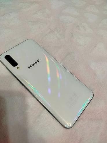 pixel 10a: Samsung Galaxy A50, Б/у, 64 ГБ, цвет - Белый, 2 SIM — 1