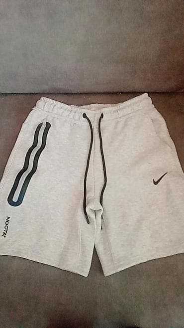 tech fleec: Спортивные шорты NOCTA x Nike - Цвет: светло‑серый меланж - Материал — 1