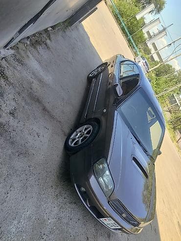 v klass: Subaru Legacy: 2000 г., Седан — 2
