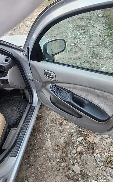 терано 1: Nissan Almera: 2002 г., 1.8 л, Автомат, Бензин, Хэтчбэк — 6