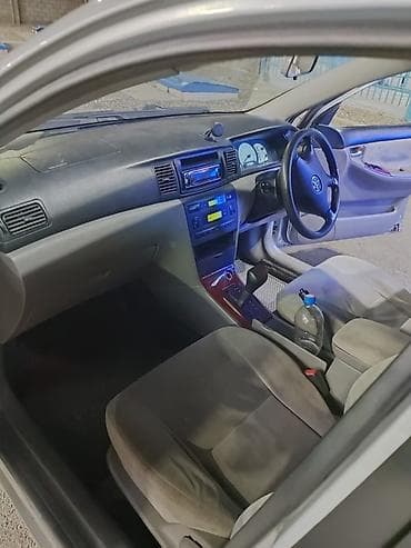 sprinter 315: Toyota Corolla: 2001 г., Бензин, Седан — 6