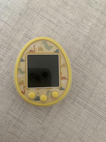 Электронная игрушка-брелок «виртуальный питомец» (тамагочи-формат) -