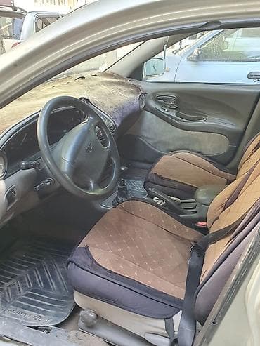 w210 210: Daewoo Leganza: 1997 г., 1.7 л, Механика, Бензин, Седан — 1